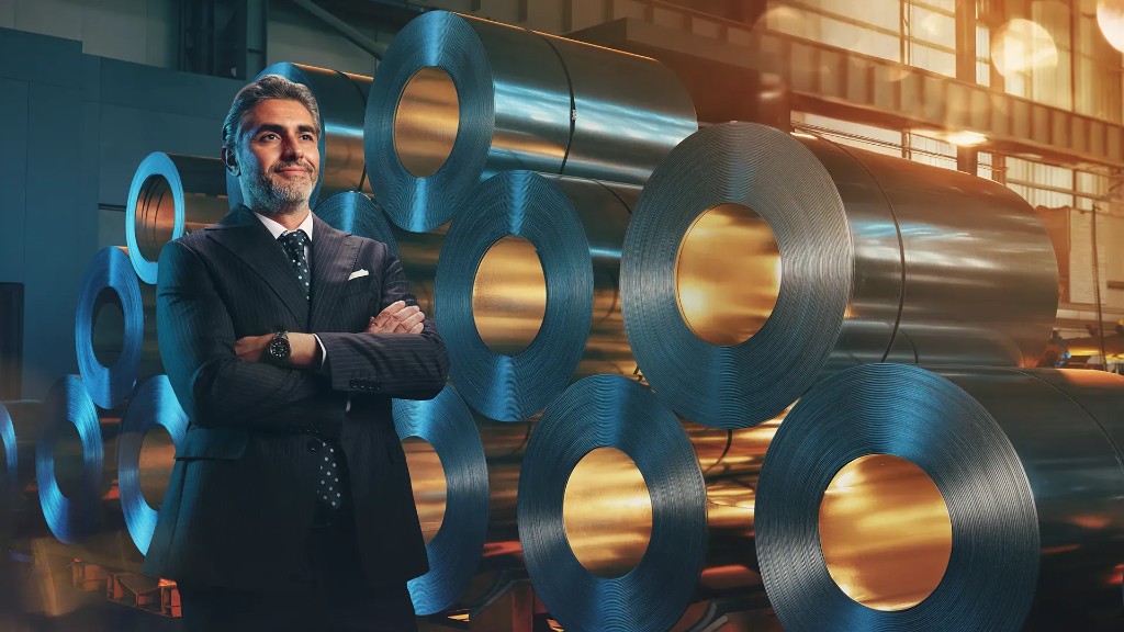 Business executive in an industrial warehouse