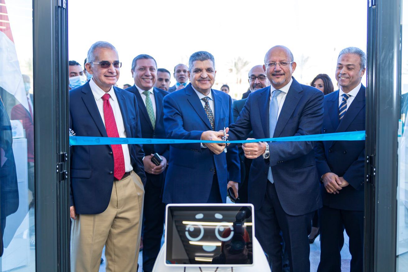A robot contributes at the opening of the latest branches of the Suez Canal Bank in Sheikh Zayed City